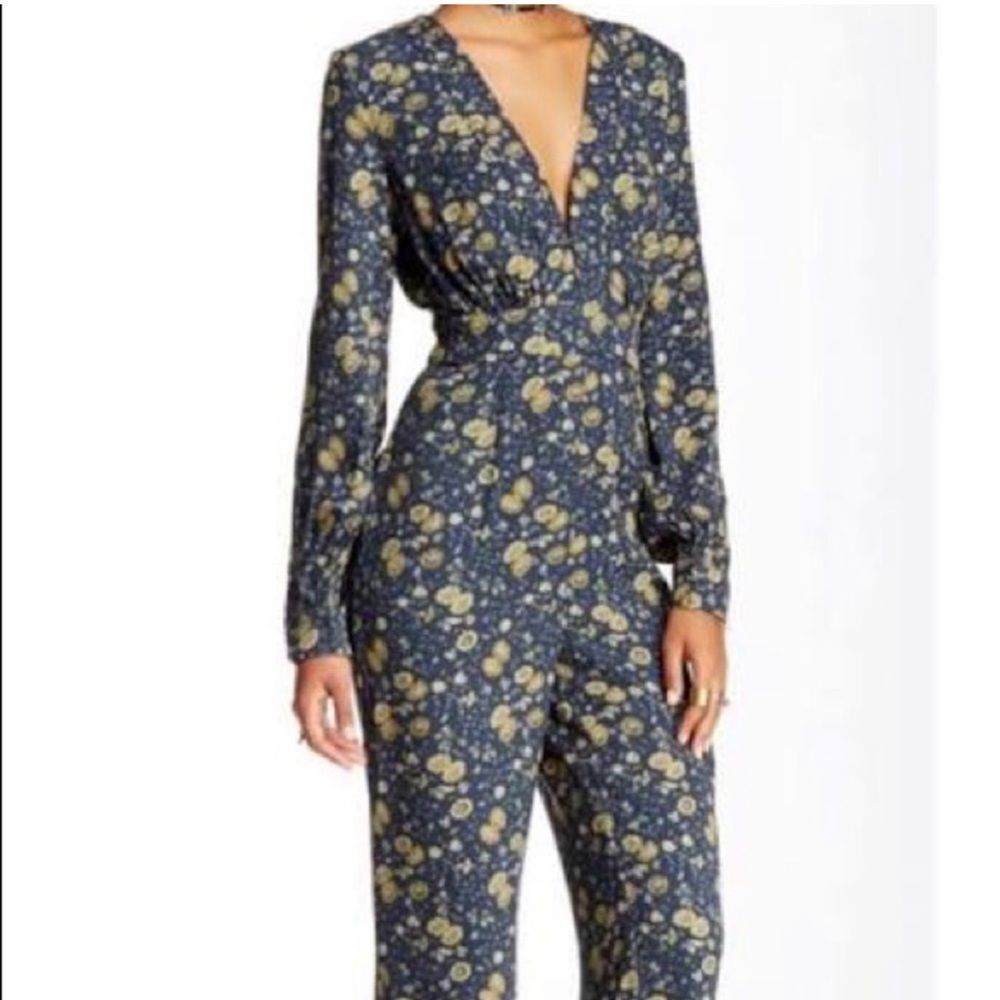 Free people some like it hot jumpsuit size